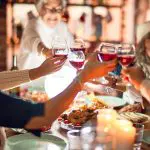 Christmas day diners celebrating getting the food delivered - Christmas Day cooking schedule and ‘To do’ list