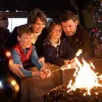 Family enjoying food at Leeds Christmas market