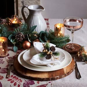lay a Christmas dinner table