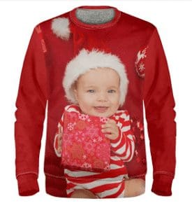 Baby face on Christmas jumper