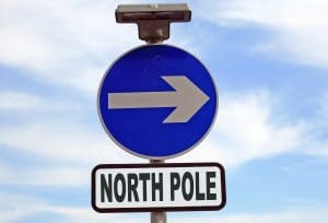 pic of a sign pointing the way to the north pole of santa and his reindeer incl rudolph christmas.co.uk
