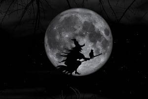 pic of a witch on a broomstick with the moon as a backdrop - Xas traditions in Norway christmas.co.uk