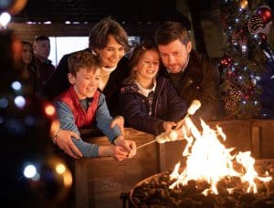 Family enjoying food at Leeds Christmas market 