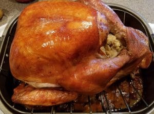 pic of a cooked turkey with christmas stuffing - Christmas stuffing – the history and recipes to impress diners