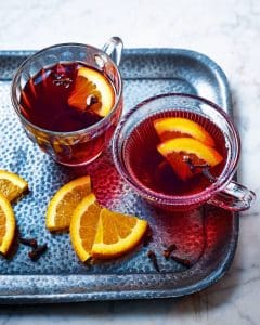 pic of cups of non-alcoholic mulled wine with orange 