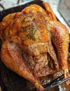 A cooked turkey ready for Christmas dinner guests
