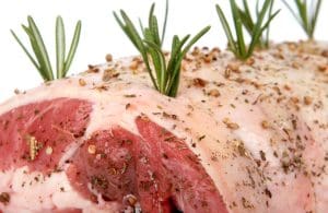 Beef with seasonong and herbs ready for the oven on Christmas Day