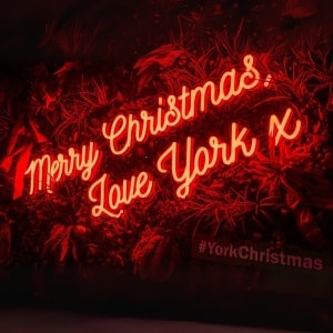York Christmas market - a neon sign greeting people to the event