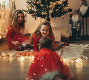 create a cosy atmosphere on Christmas Day christmas co uk Young children having fun in festive outfits and help create a cosy atmosphere on Christmas Day